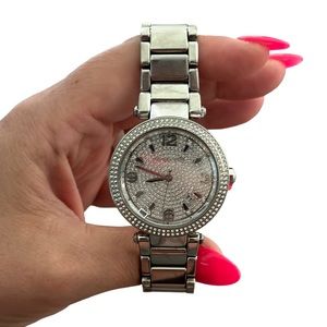 MICHAEL KORS 360 MK6509 Silver watch. 16 ish- inches on my wrist.